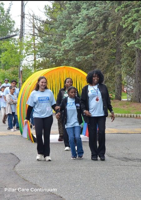 Volunteer doing a Walk to Support People Living with Disabilities at Pillar Care Continuum